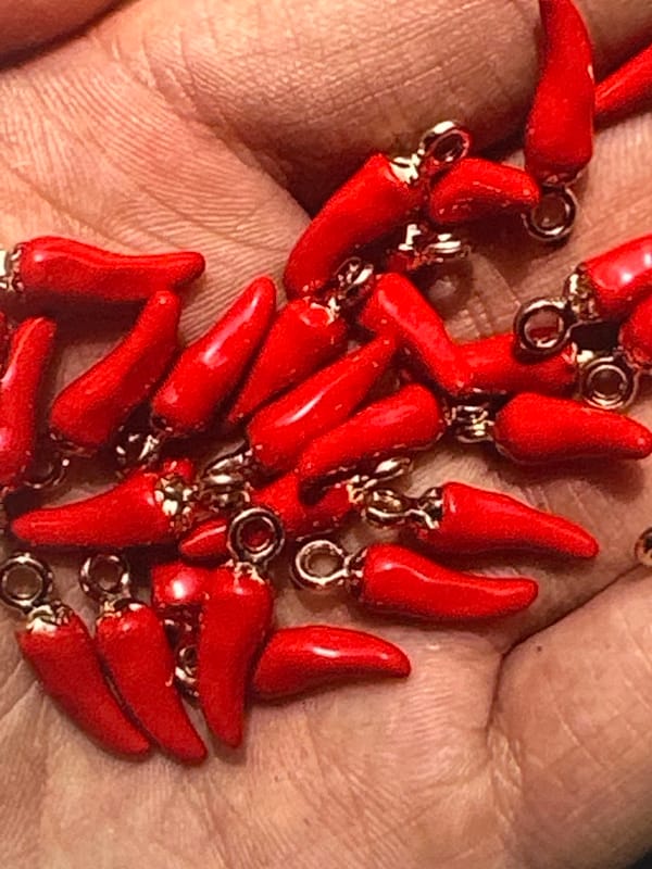 Overhead look at a sprawling haul of craft beads and charms