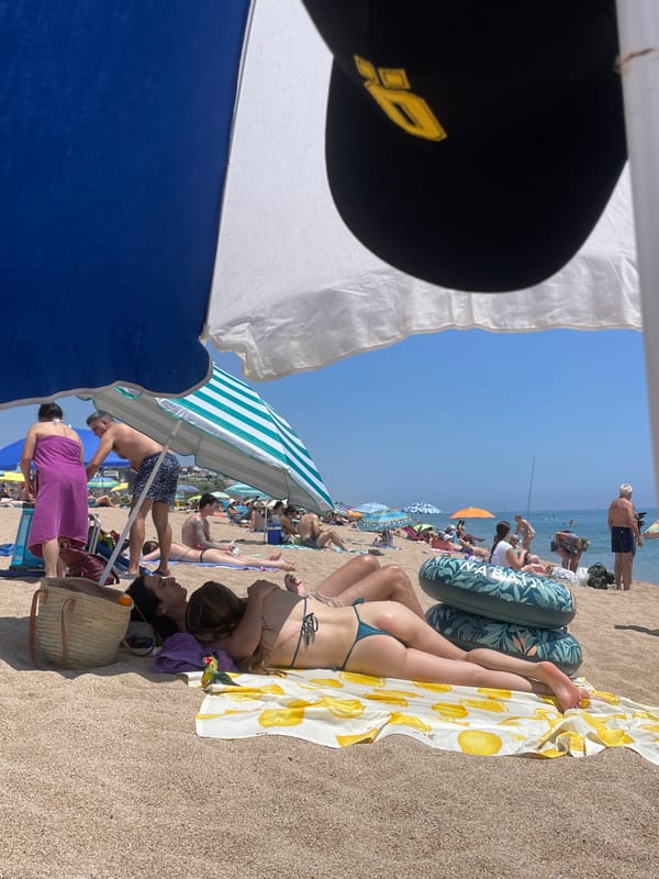 Busy summer beach day captured in Mataró, Spain