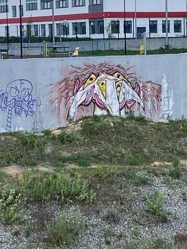 Spring day documented through Yekaterinburg street art and blooming trees