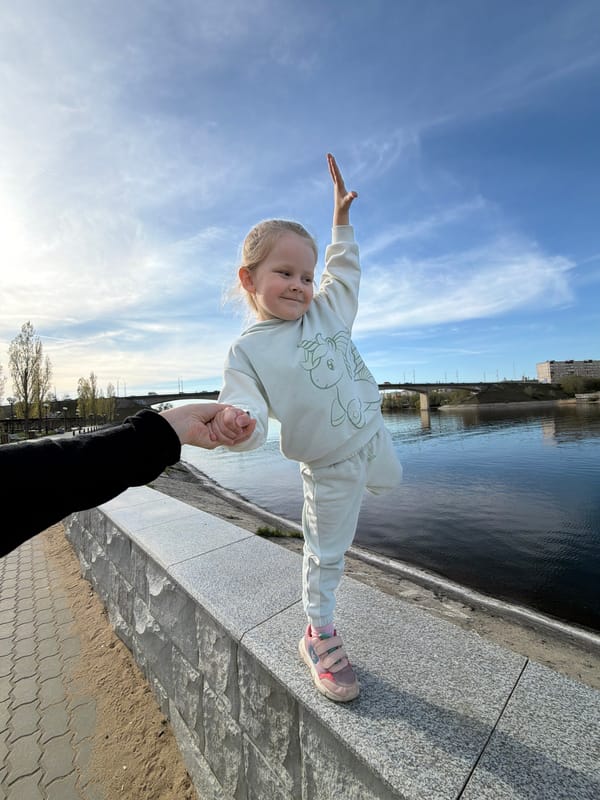 Child plays at skate park, waterfront in Kamyshin Russia