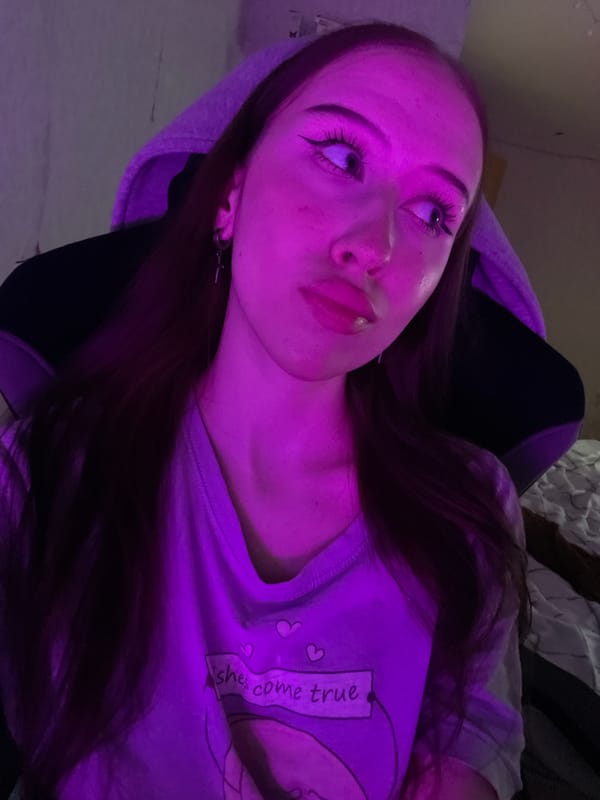 Purple-lit bedroom selfie session in Votkinsk, Russia