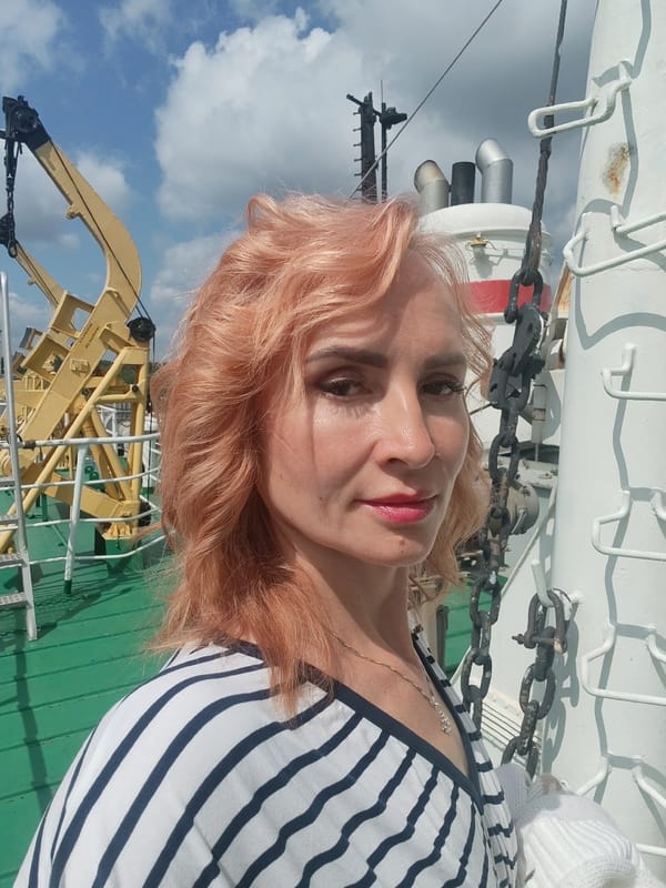 Selfie on a ship deck with pink hair and nautical vibes