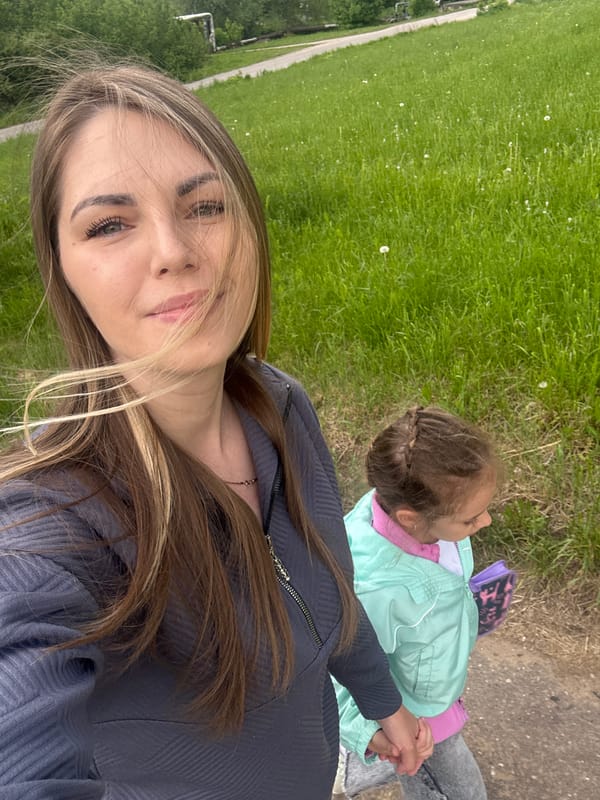 Mother and child enjoy outdoor moment before approaching storm