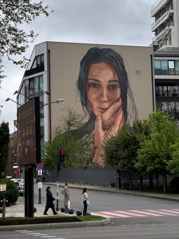 Woman documents casual walk through downtown Tbilisi streets