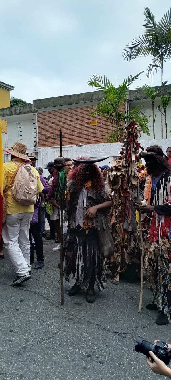 Street parade with musicians and costumes in Caracas