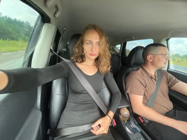 In-car selfie moment with two passengers near Shud'ya, Russia