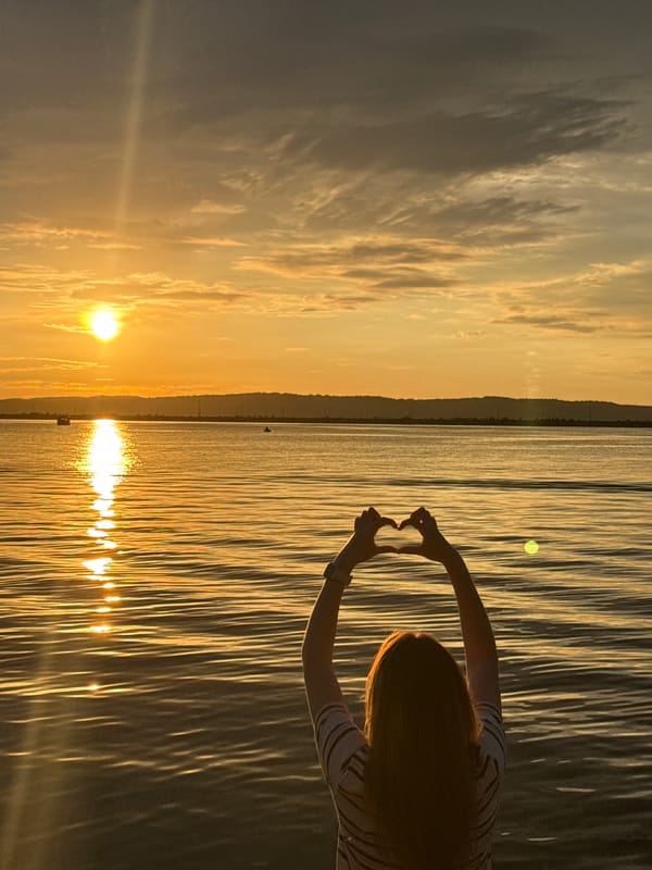 Summer evening on the Kama River dock at sunset