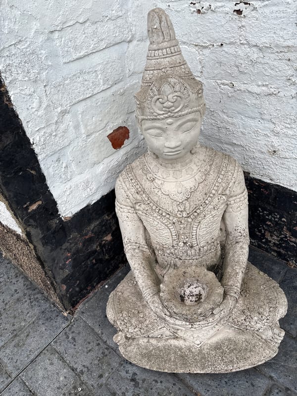 Stone Buddha statue spotted outdoors in Minsterley, UK
