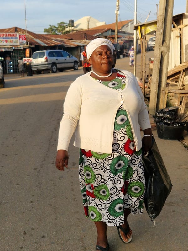 Morning street life and sunset skies in an African urban setting