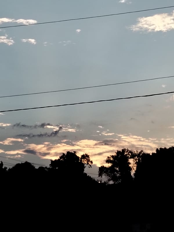 Evening skies and quiet rural details in Ustyvytsia, Ukraine