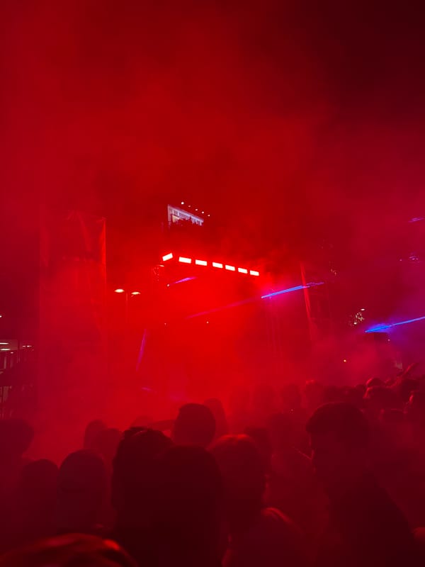 Red-lit indoor event draws crowds in Milan venue