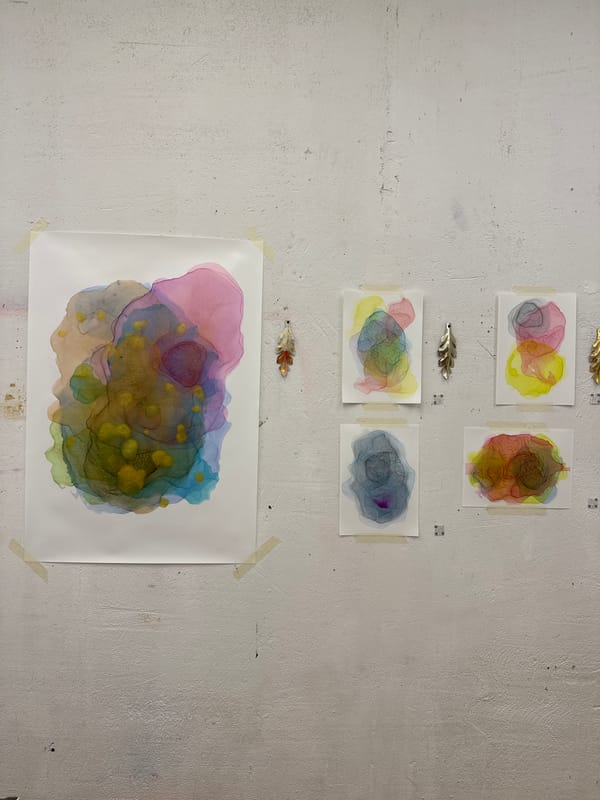 Watercolor paintings and handwritten Russian note observed in Moscow
