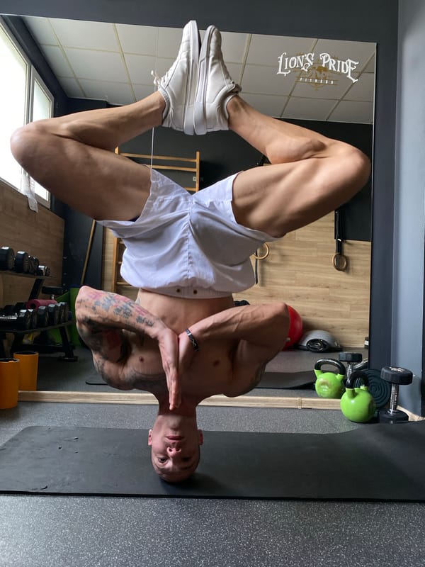 Tattooed man works out at Pleven gym