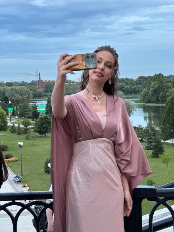 Formal gathering on a riverside balcony in central Russia