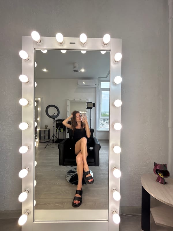Woman documents morning selfie session across salon and urban locations
