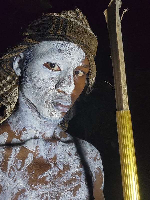Traditional ceremony with white body paint documented in Onitsha