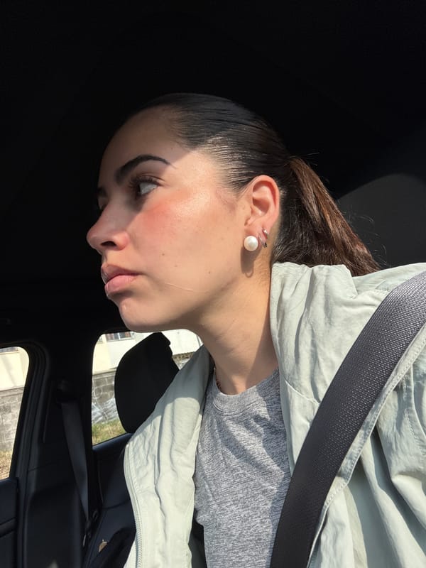 Person photographed in vehicle during daytime in Tlaxcalancingo, Mexico