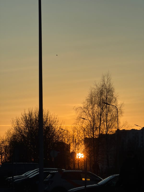 Backlit urban sunset scene captured in Riga, Latvia