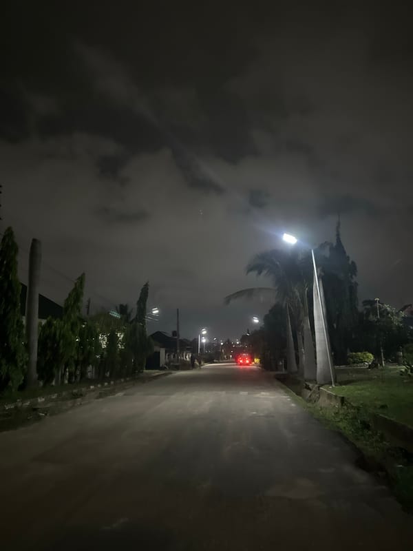 Nighttime residential streets in Abuja, quiet and overcast