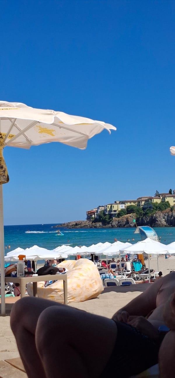 Beachside chill in Sozopol: sand, beanbags, pizza, cocktails.