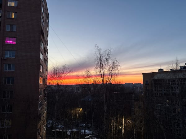 Sunset documented across Izhevsk cityscape during evening hours
