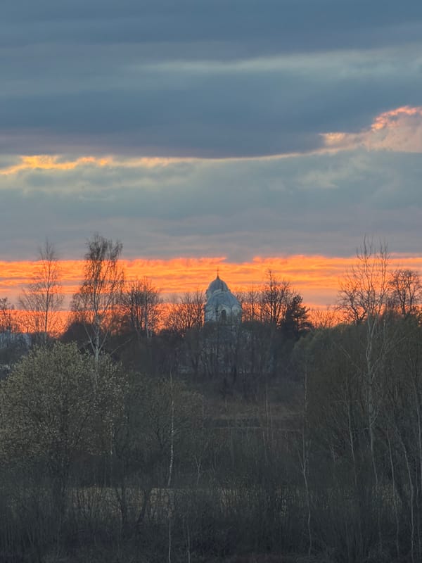 Sunset observed over classical building and water at remote location
