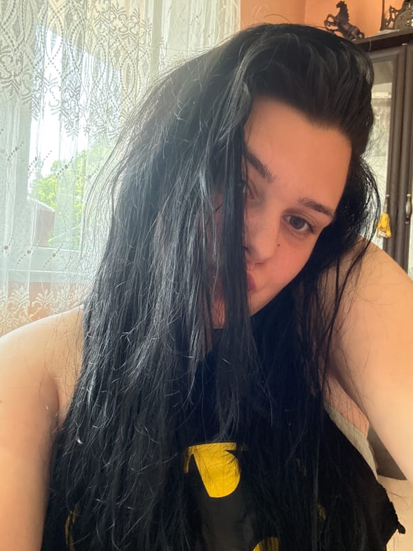 Woman takes multiple selfies in Rogosh, Bulgaria home