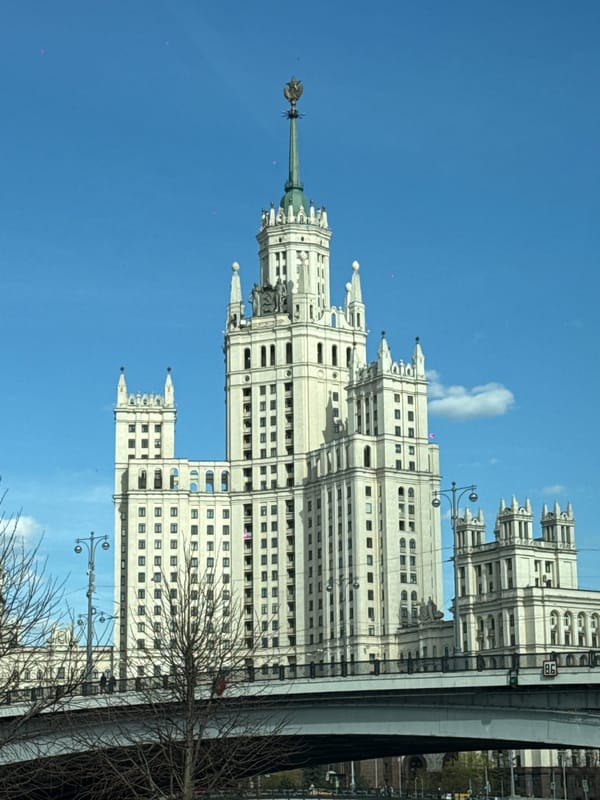 Moscow skyline and Stalinist architecture observed from city bridge