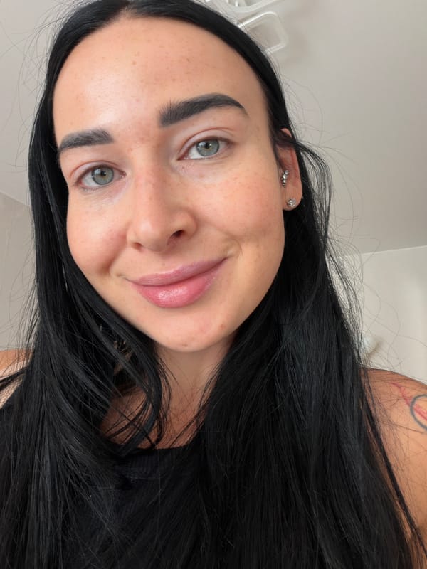 Woman documents morning routine with breakfast and beauty preparations