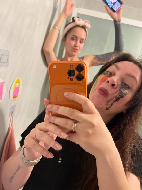 Woman takes selfies with heart stickers in Noviy, Russia