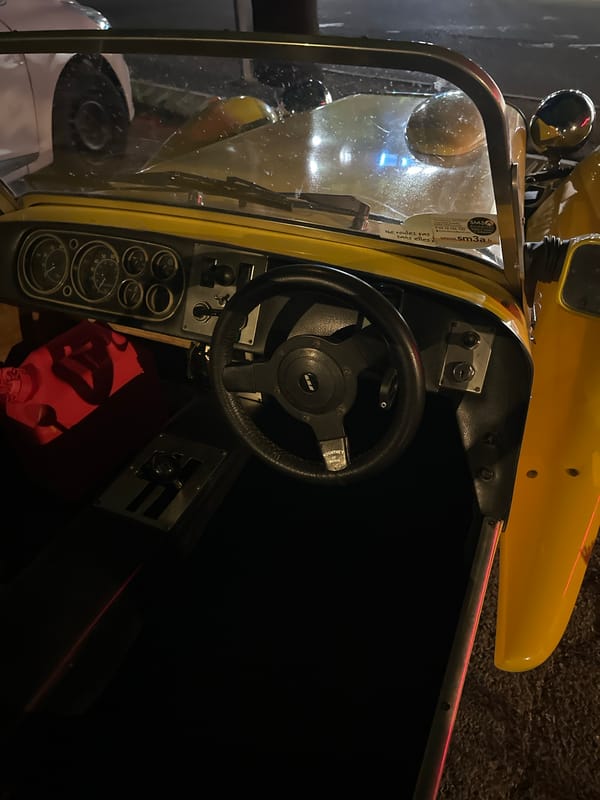 Yellow sports car and late-night streets in Anduze