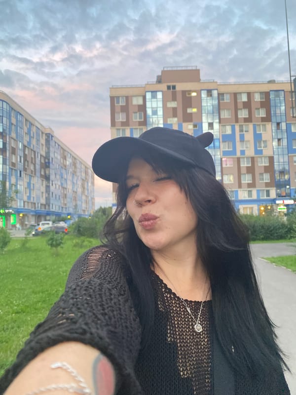 Selfies outside modern apartments in Yanino-1, Russia
