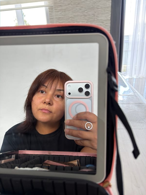 Mirror selfie and direct shot, black tee, same person