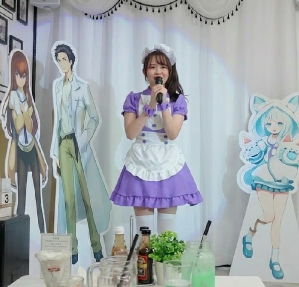 Maid cafe worker photographed during service in Shinjuku