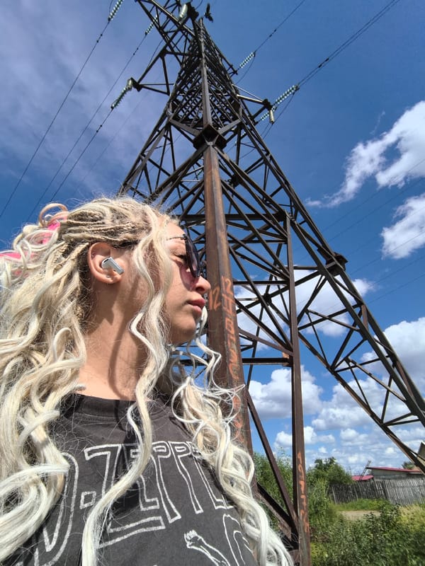 Exploring a power pylon on a sunny morning in Noviy, Russia