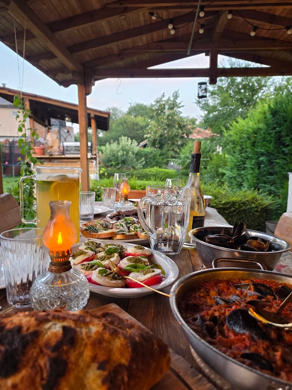 Patio dining with a citrus-mint pitcher in rural Bulgaria