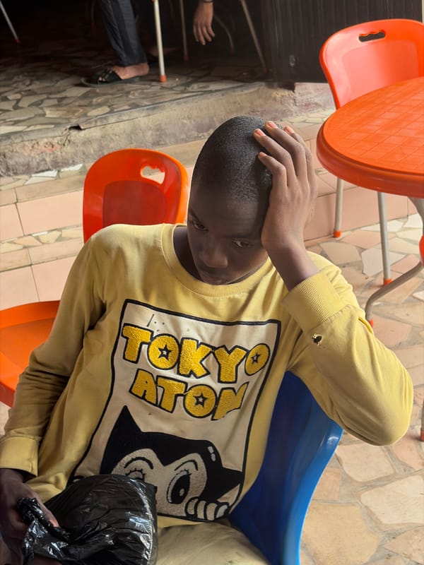 Casual outdoor dining gathering captured in Gura Top, Nigeria