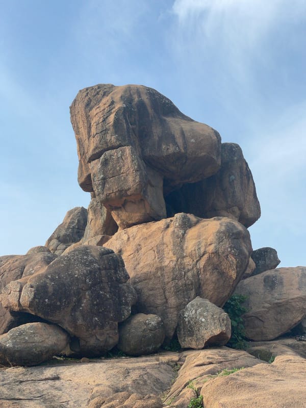Rock formations and village rooftops documented in Nigeria
