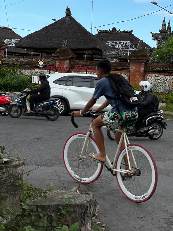 Morning street food vendor operates in Denpasar