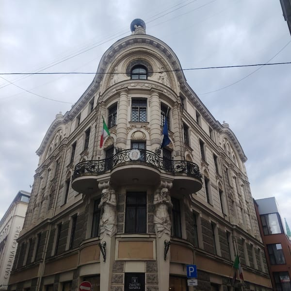 Tourist captures Riga restaurants and hotels during afternoon walk
