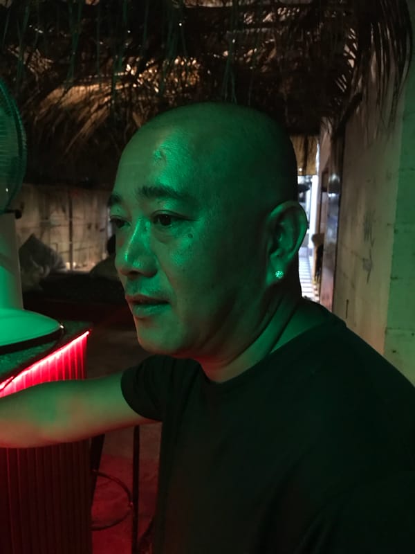 Casual bar hangout with music, dogs captured in Mũi Né