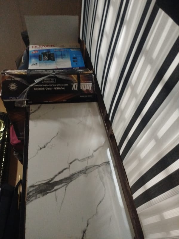 Interior details and everyday objects inside a room in Ogbomosho