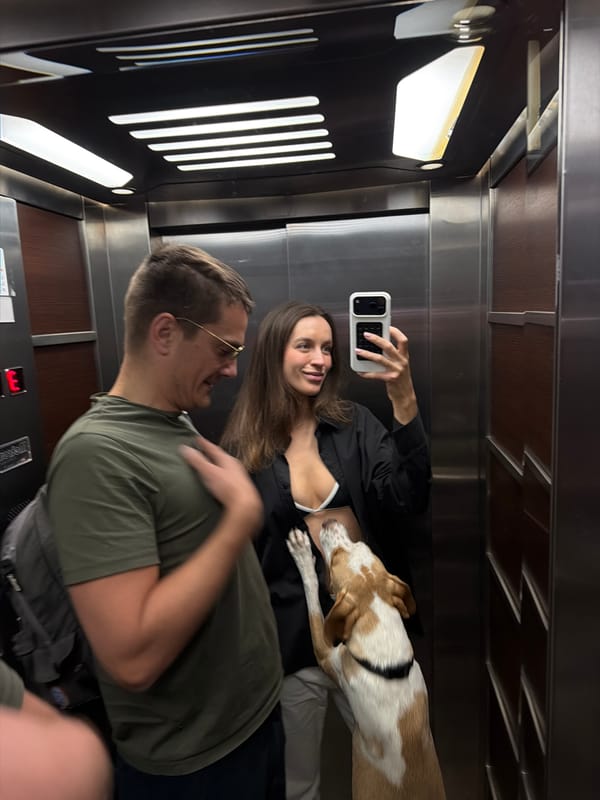 Couple takes elevator selfie with dog in Budva