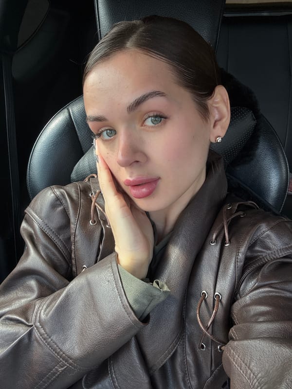 Woman documents morning routine through selfies in Лобаново, Russia