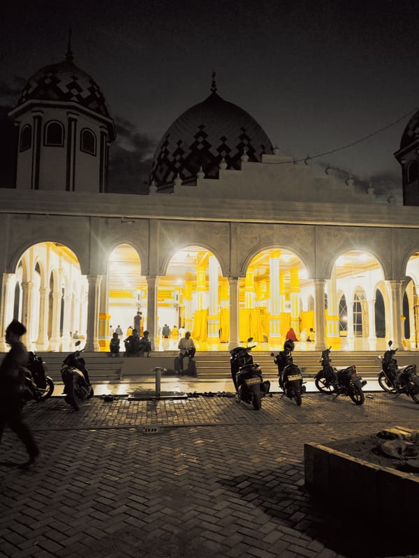 Nighttime scenes captured at Baiturrahman Mosque in Meunasahlhok, Indonesia