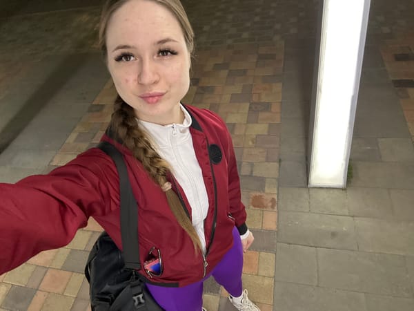 Woman with braided hair spotted in urban park area