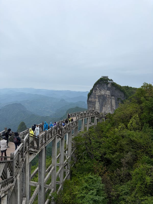 Tourists visit Tianmen Mountain walkway in Zhangjiajie, China