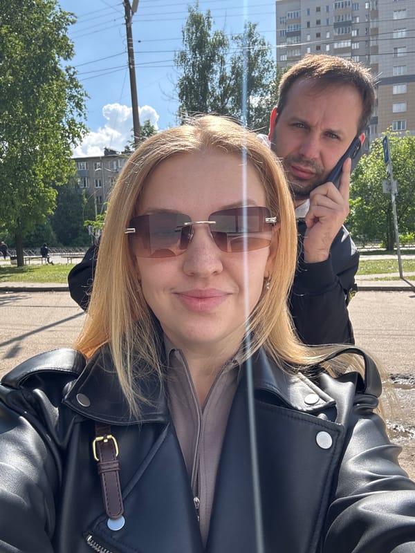 Woman in black jacket documented across multiple Rusanovo locations