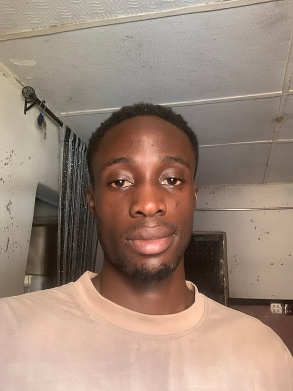 Young man documents afternoon through selfies in Lokoja home