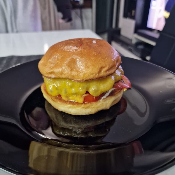 Diner captures burger meal with German beer in Sofia